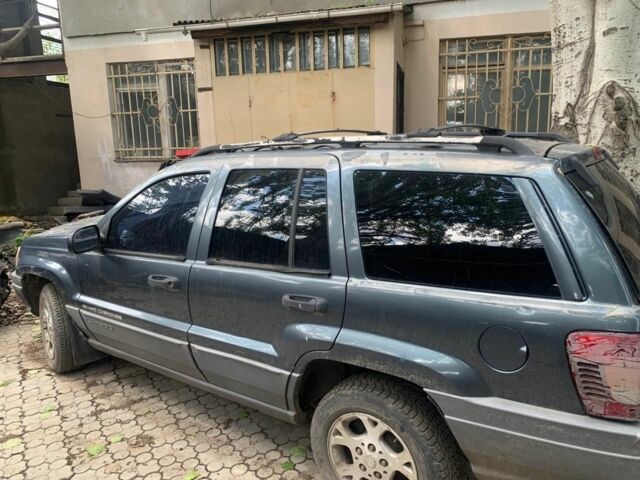 Синий Джип Гранд Чероки, объемом двигателя 4 л и пробегом 200 тыс. км за 3700 $, фото 7 на Automoto.ua