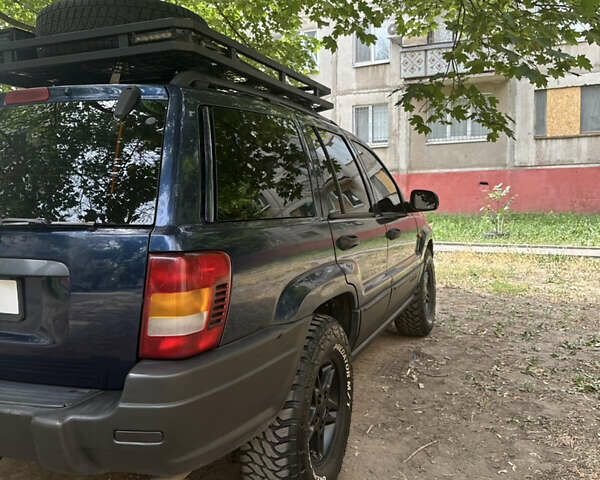 Синій Джип Grand Cherokee, об'ємом двигуна 2.69 л та пробігом 289 тис. км за 10000 $, фото 6 на Automoto.ua