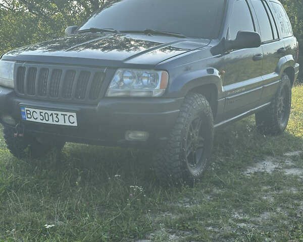 Синій Джип Grand Cherokee, об'ємом двигуна 2.69 л та пробігом 289 тис. км за 10000 $, фото 2 на Automoto.ua