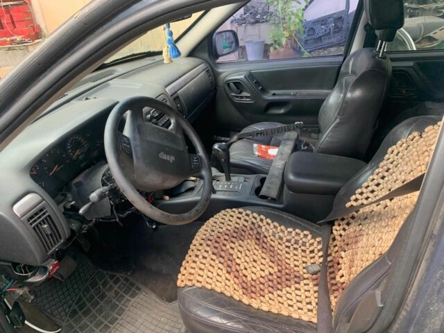 Синий Джип Гранд Чероки, объемом двигателя 4 л и пробегом 200 тыс. км за 3700 $, фото 3 на Automoto.ua