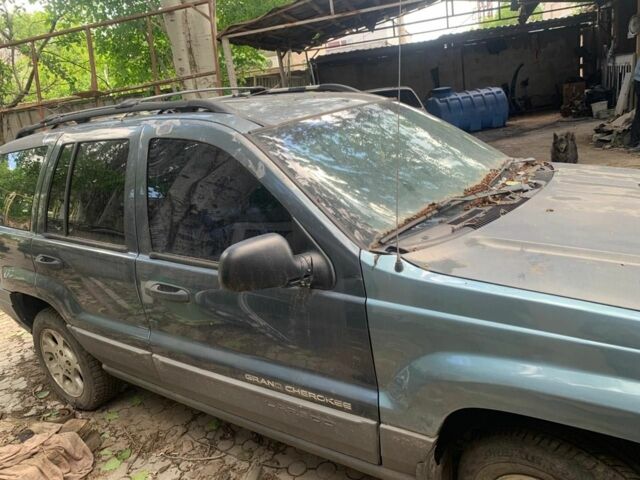 Синий Джип Гранд Чероки, объемом двигателя 4 л и пробегом 200 тыс. км за 3700 $, фото 8 на Automoto.ua