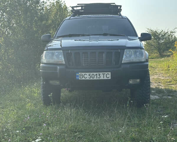 Синій Джип Grand Cherokee, об'ємом двигуна 2.69 л та пробігом 289 тис. км за 10000 $, фото 1 на Automoto.ua