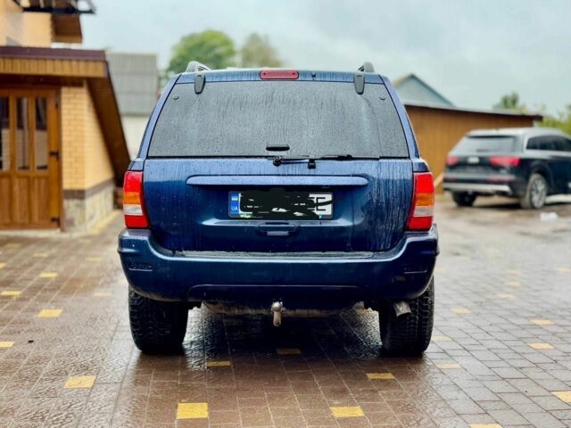 Джип Grand Cherokee 2002 у Харкові на Automoto.ua Синій Джип Grand Cherokee, об'ємом двигуна 0 л та пробігом 320 тис. км за 2500 $, фото 1 на Automoto.ua