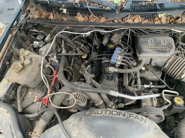 Синий Джип Гранд Чероки, объемом двигателя 4 л и пробегом 200 тыс. км за 3700 $, фото 6 на Automoto.ua