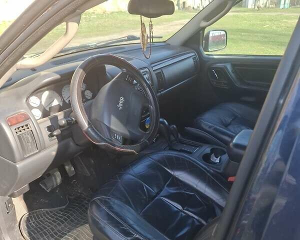 Синій Джип Grand Cherokee, об'ємом двигуна 2.69 л та пробігом 320 тис. км за 6000 $, фото 5 на Automoto.ua