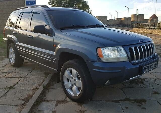 Синий Джип Гранд Чероки, объемом двигателя 2.7 л и пробегом 300 тыс. км за 10800 $, фото 2 на Automoto.ua
