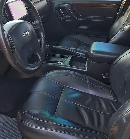Синий Джип Гранд Чероки, объемом двигателя 2.7 л и пробегом 300 тыс. км за 10800 $, фото 10 на Automoto.ua