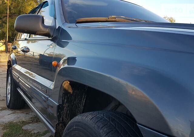 Синий Джип Гранд Чероки, объемом двигателя 2.7 л и пробегом 300 тыс. км за 10800 $, фото 1 на Automoto.ua