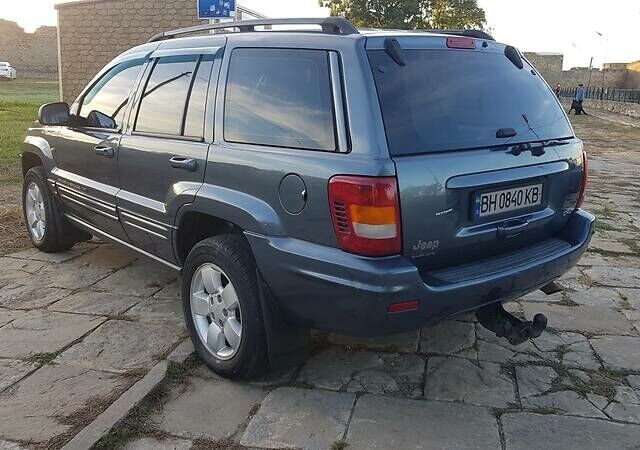 Синий Джип Гранд Чероки, объемом двигателя 2.7 л и пробегом 300 тыс. км за 10800 $, фото 4 на Automoto.ua