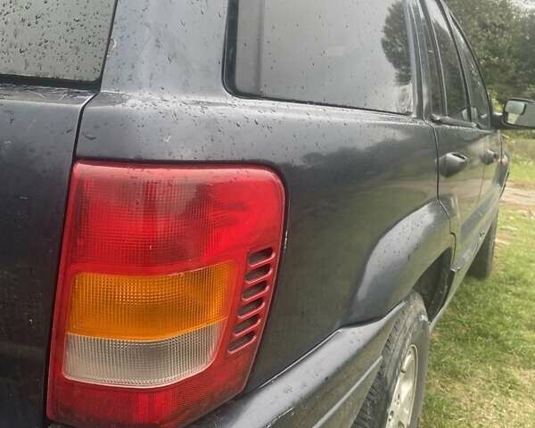 Синій Джип Grand Cherokee, об'ємом двигуна 4 л та пробігом 295 тис. км за 5700 $, фото 9 на Automoto.ua