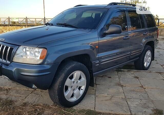 Синий Джип Гранд Чероки, объемом двигателя 2.7 л и пробегом 300 тыс. км за 10800 $, фото 5 на Automoto.ua