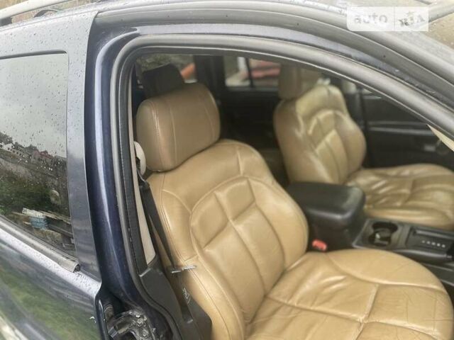 Синій Джип Grand Cherokee, об'ємом двигуна 4 л та пробігом 295 тис. км за 5700 $, фото 10 на Automoto.ua