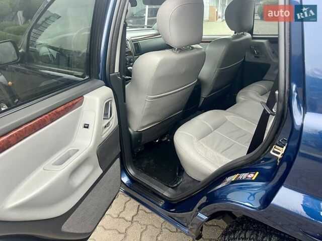 Синий Джип Гранд Чероки, объемом двигателя 2.69 л и пробегом 343 тыс. км за 9000 $, фото 19 на Automoto.ua