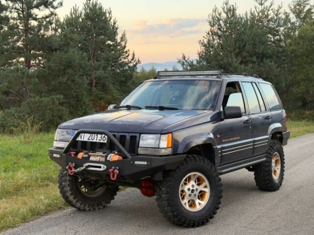 Синій Джип Grand Cherokee, об'ємом двигуна 3 л та пробігом 245 тис. км за 3400 $, фото 1 на Automoto.ua