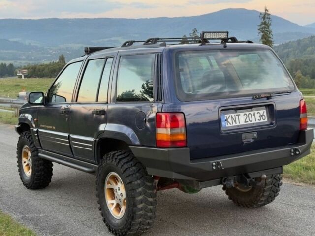 Синій Джип Grand Cherokee, об'ємом двигуна 3 л та пробігом 245 тис. км за 3400 $, фото 5 на Automoto.ua