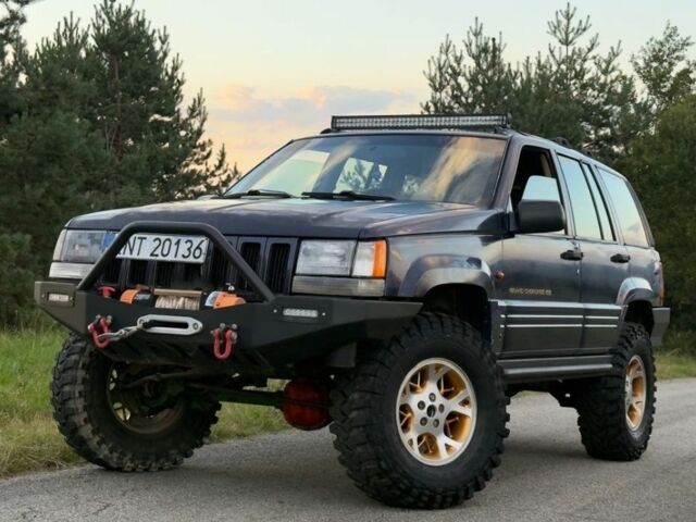 Синій Джип Grand Cherokee, об'ємом двигуна 3 л та пробігом 245 тис. км за 3400 $, фото 2 на Automoto.ua