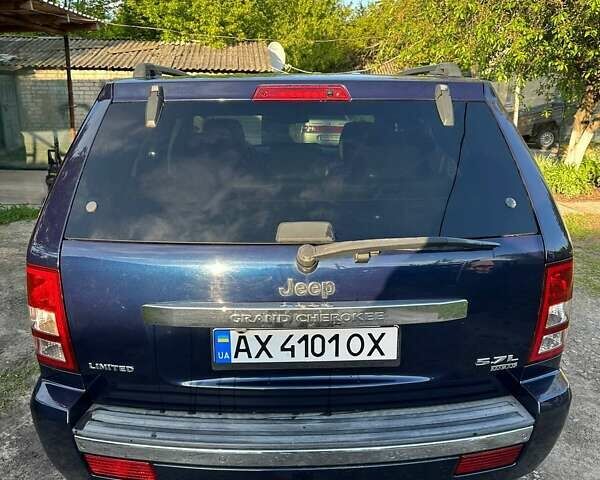 Синий Джип Гранд Чероки, объемом двигателя 5.65 л и пробегом 198 тыс. км за 11500 $, фото 2 на Automoto.ua