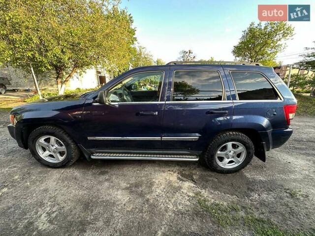 Синий Джип Гранд Чероки, объемом двигателя 5.65 л и пробегом 198 тыс. км за 11500 $, фото 4 на Automoto.ua