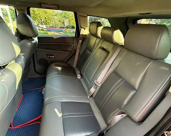 Синий Джип Гранд Чероки, объемом двигателя 5.65 л и пробегом 198 тыс. км за 11500 $, фото 8 на Automoto.ua