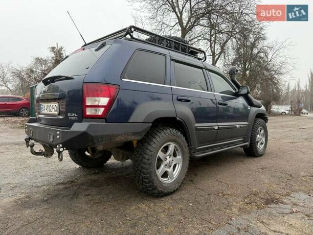Синий Джип Гранд Чероки, объемом двигателя 5.65 л и пробегом 230 тыс. км за 15900 $, фото 4 на Automoto.ua