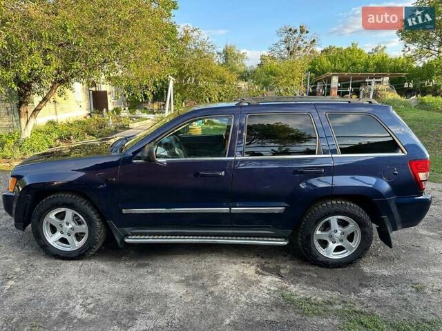 Синий Джип Гранд Чероки, объемом двигателя 5.65 л и пробегом 198 тыс. км за 11500 $, фото 5 на Automoto.ua