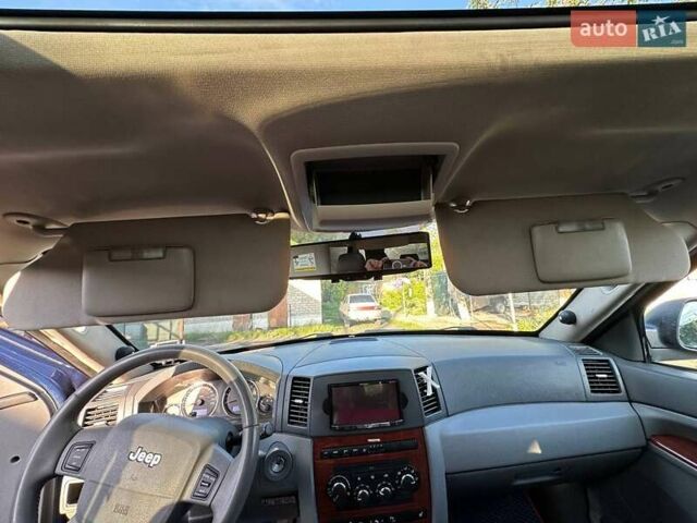 Синий Джип Гранд Чероки, объемом двигателя 5.65 л и пробегом 198 тыс. км за 11500 $, фото 1 на Automoto.ua