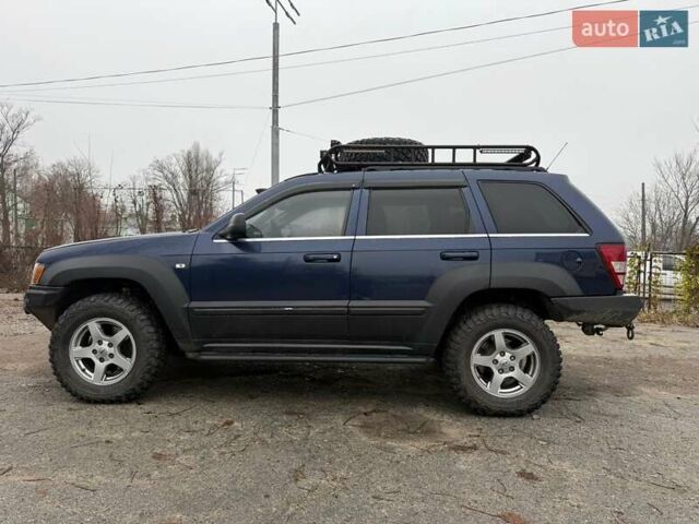 Синий Джип Гранд Чероки, объемом двигателя 5.65 л и пробегом 230 тыс. км за 15900 $, фото 7 на Automoto.ua