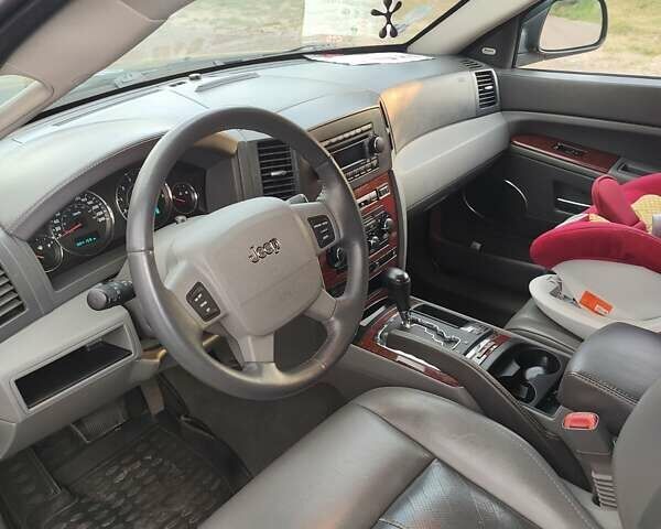 Синій Джип Grand Cherokee, об'ємом двигуна 3 л та пробігом 304 тис. км за 10500 $, фото 3 на Automoto.ua