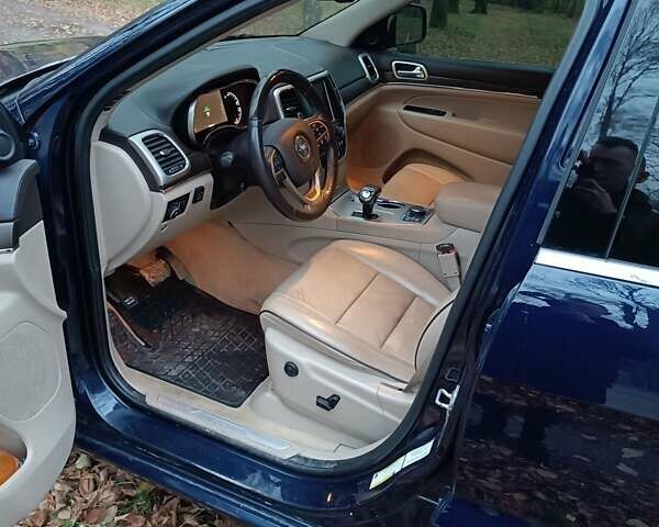 Синій Джип Grand Cherokee, об'ємом двигуна 5.7 л та пробігом 160 тис. км за 24000 $, фото 7 на Automoto.ua