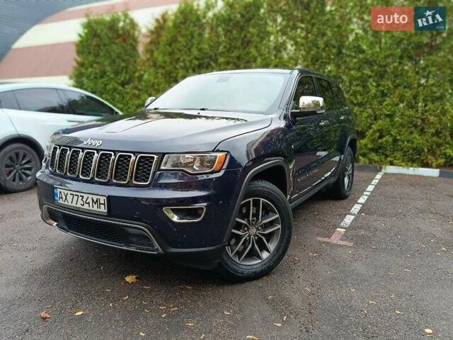 Синий Джип Гранд Чероки, объемом двигателя 5.65 л и пробегом 128 тыс. км за 27400 $, фото 4 на Automoto.ua