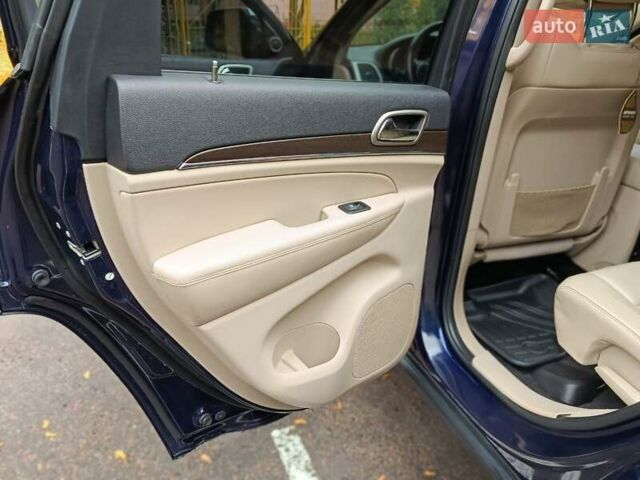 Синий Джип Гранд Чероки, объемом двигателя 5.65 л и пробегом 128 тыс. км за 27400 $, фото 17 на Automoto.ua