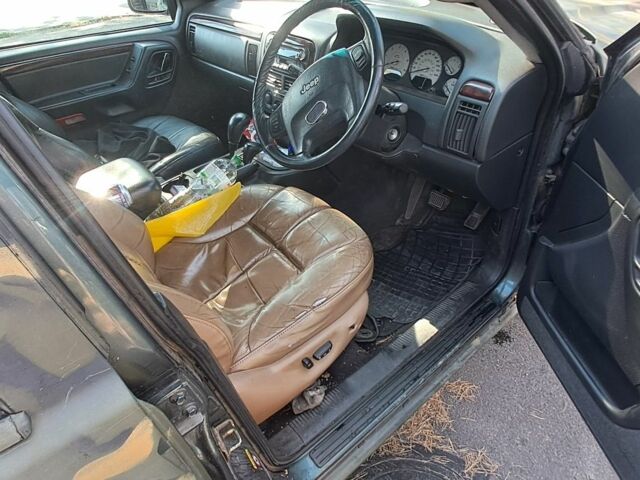 Зеленый Джип Гранд Чероки, объемом двигателя 2.7 л и пробегом 2 тыс. км за 3500 $, фото 1 на Automoto.ua