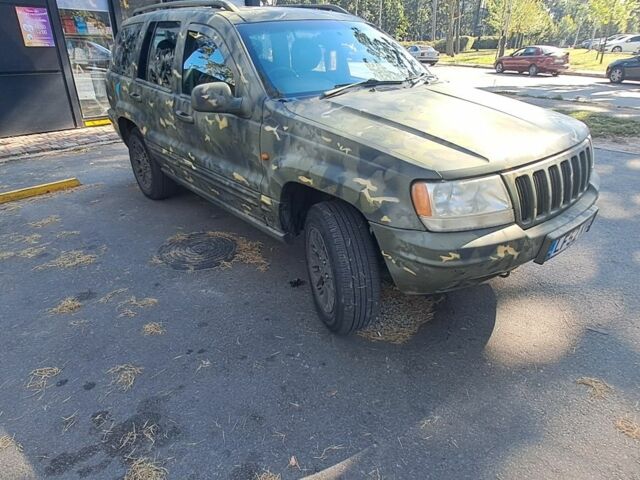 Зеленый Джип Гранд Чероки, объемом двигателя 2.7 л и пробегом 2 тыс. км за 3500 $, фото 4 на Automoto.ua