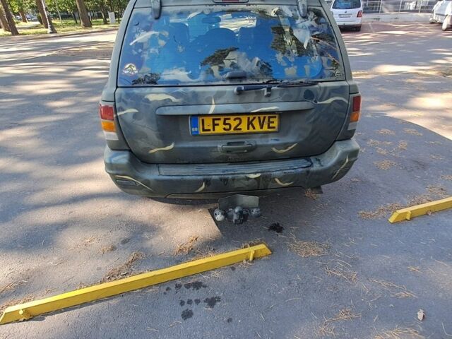 Зеленый Джип Гранд Чероки, объемом двигателя 2.7 л и пробегом 2 тыс. км за 3500 $, фото 2 на Automoto.ua