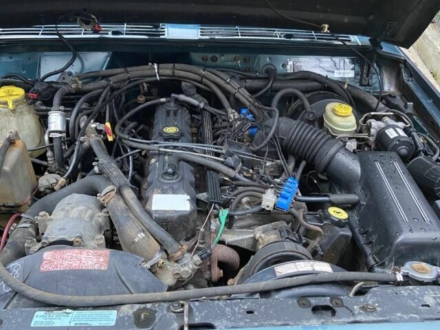 Зеленый Джип Гранд Чероки, объемом двигателя 4 л и пробегом 260 тыс. км за 3999 $, фото 2 на Automoto.ua