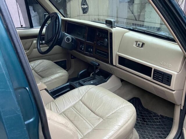 Зеленый Джип Гранд Чероки, объемом двигателя 4 л и пробегом 260 тыс. км за 3999 $, фото 3 на Automoto.ua