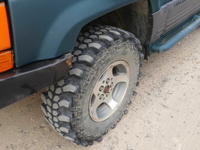 Зеленый Джип Гранд Чероки, объемом двигателя 2.5 л и пробегом 312 тыс. км за 9600 $, фото 5 на Automoto.ua