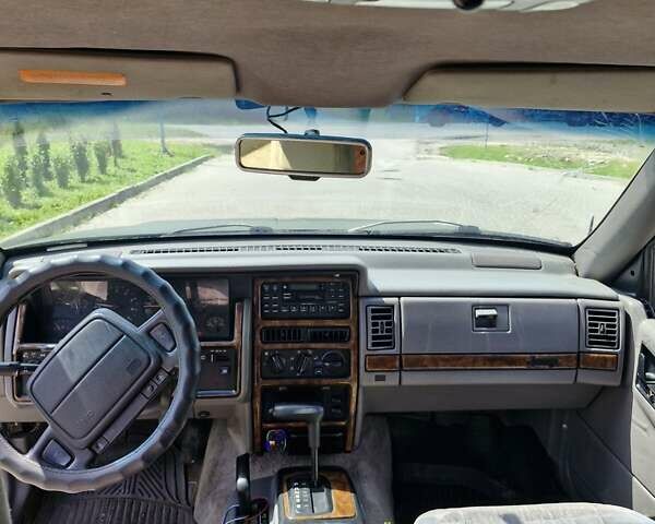 Зеленый Джип Гранд Чероки, объемом двигателя 4 л и пробегом 700 тыс. км за 6000 $, фото 1 на Automoto.ua