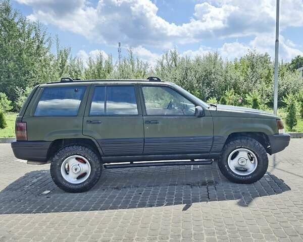 Зеленый Джип Гранд Чероки, объемом двигателя 4 л и пробегом 700 тыс. км за 6000 $, фото 8 на Automoto.ua