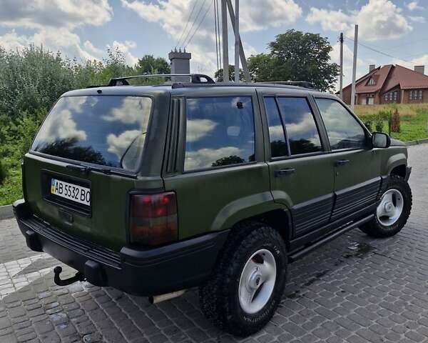 Зеленый Джип Гранд Чероки, объемом двигателя 4 л и пробегом 700 тыс. км за 6000 $, фото 7 на Automoto.ua