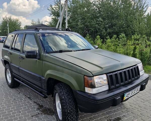 Зеленый Джип Гранд Чероки, объемом двигателя 4 л и пробегом 700 тыс. км за 6000 $, фото 5 на Automoto.ua