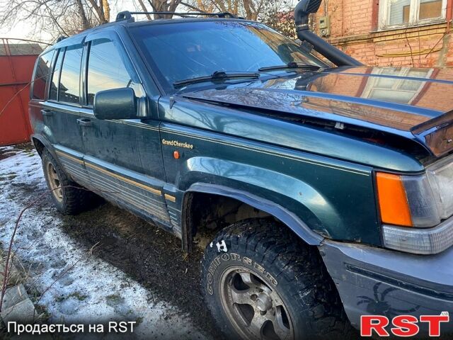 Зелений Джип Grand Cherokee, об'ємом двигуна 4 л та пробігом 330 тис. км за 3300 $, фото 3 на Automoto.ua