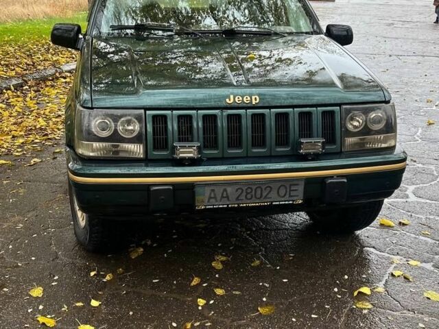 Зелений Джип Grand Cherokee, об'ємом двигуна 5.2 л та пробігом 200 тис. км за 3900 $, фото 2 на Automoto.ua
