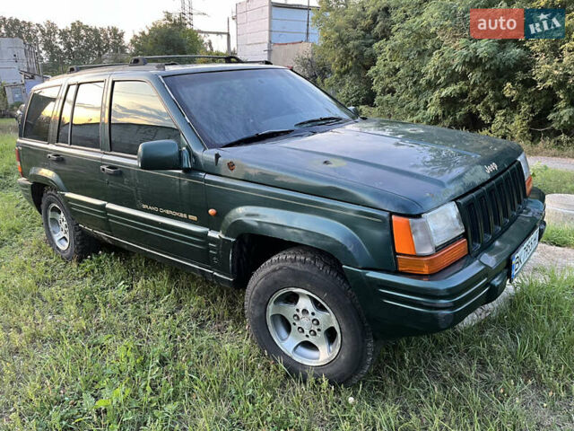 Зелений Джип Grand Cherokee, об'ємом двигуна 2.5 л та пробігом 384 тис. км за 3750 $, фото 5 на Automoto.ua