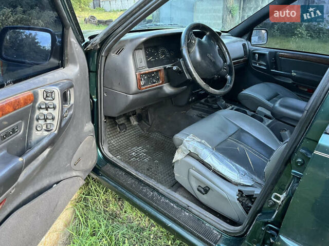 Зелений Джип Grand Cherokee, об'ємом двигуна 2.5 л та пробігом 384 тис. км за 3750 $, фото 9 на Automoto.ua