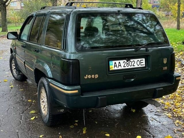 Зелений Джип Grand Cherokee, об'ємом двигуна 5.2 л та пробігом 200 тис. км за 3900 $, фото 4 на Automoto.ua