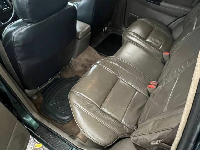 Зелений Джип Grand Cherokee, об'ємом двигуна 5.2 л та пробігом 200 тис. км за 3900 $, фото 6 на Automoto.ua