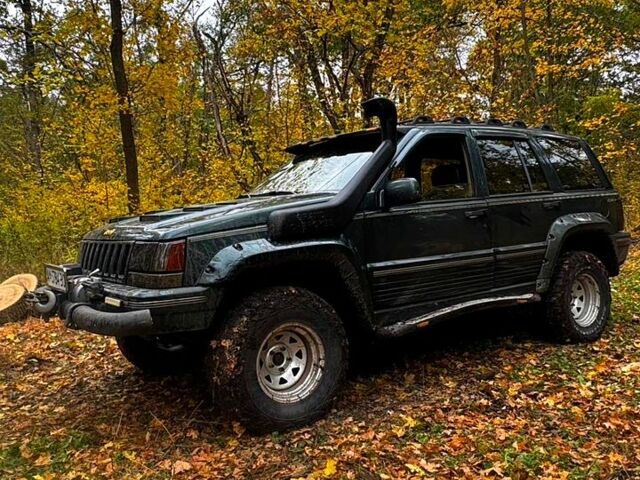 Зеленый Джип Гранд Чероки, объемом двигателя 5.2 л и пробегом 200 тыс. км за 5000 $, фото 2 на Automoto.ua
