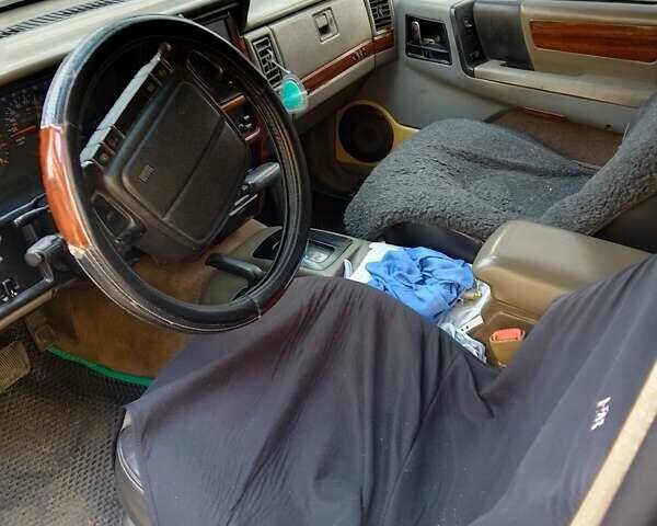 Зелений Джип Grand Cherokee, об'ємом двигуна 4 л та пробігом 382 тис. км за 4600 $, фото 3 на Automoto.ua