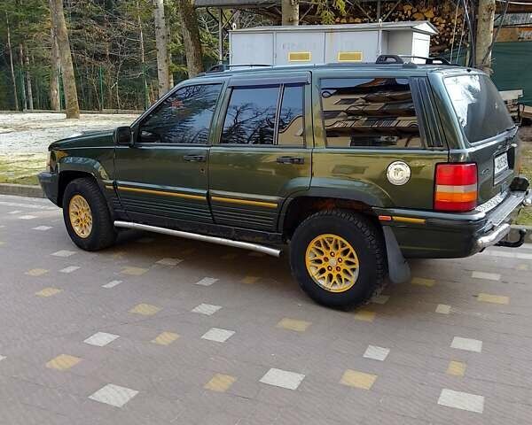 Зелений Джип Grand Cherokee, об'ємом двигуна 4 л та пробігом 382 тис. км за 4600 $, фото 2 на Automoto.ua